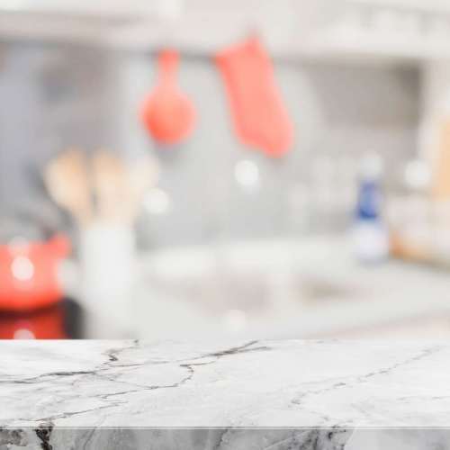 white-stone-table-top-blurred-kitchen-interior-background-can-used-display-montage-your-products-min